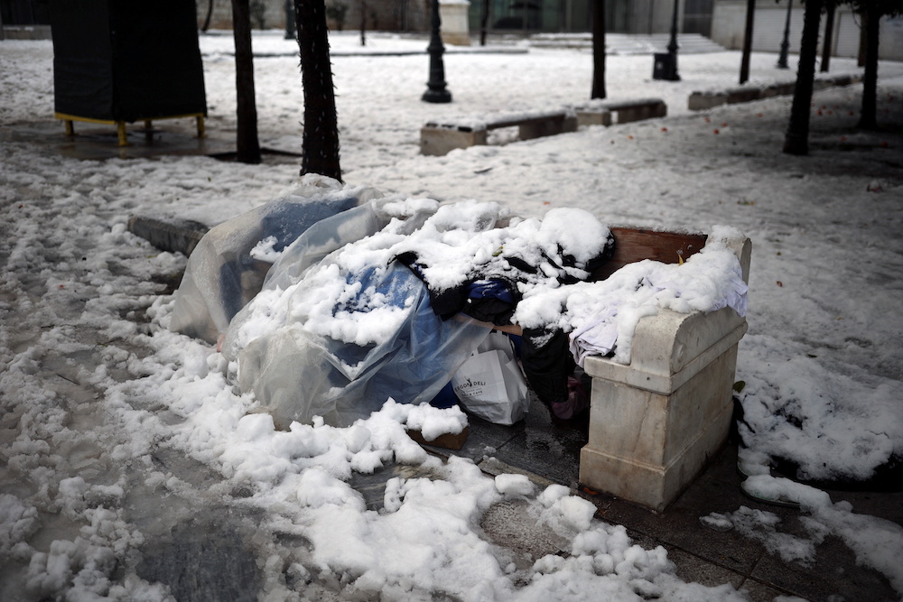 Belongings of a homeless person are covered with snow on Syntagma square, following heavy snowfall in Athens, Greece, January 25, 2022. u00e2u20acu201d Reuters pic
