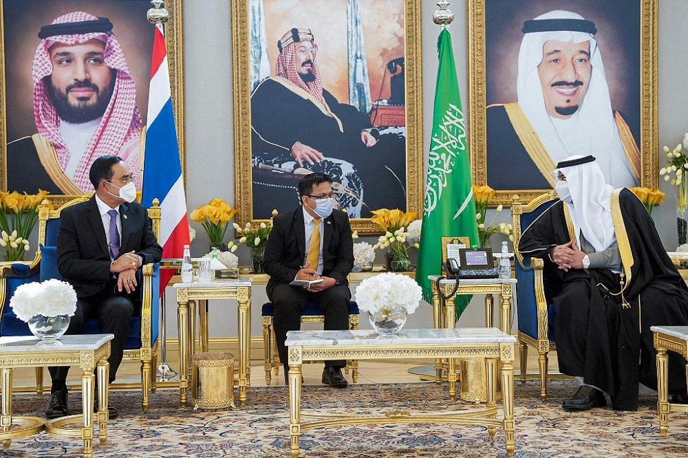 Saudi deputy Governor of Riyadh Prince Mohammed bin Abdulrahman bin Abdelazziz (right) receiving Thailandu00e2u20acu2122s Prime Minister Prayut Chan-O-Cha (left) at King Khalid International airport in Riyadh January 25, 2022.u00e2u20acu201d Handout via AFP