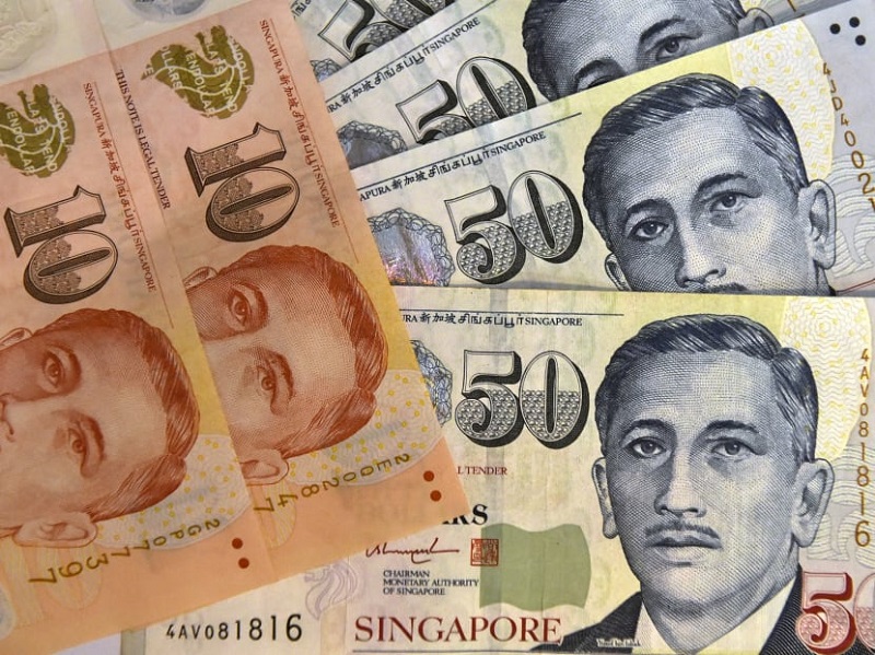 The Monetary Authority of Singapore, which manages monetary policy through exchange rate settings, said that it would slightly raise the rate of appreciation of its policy band. u00e2u20acu201d AFP pic