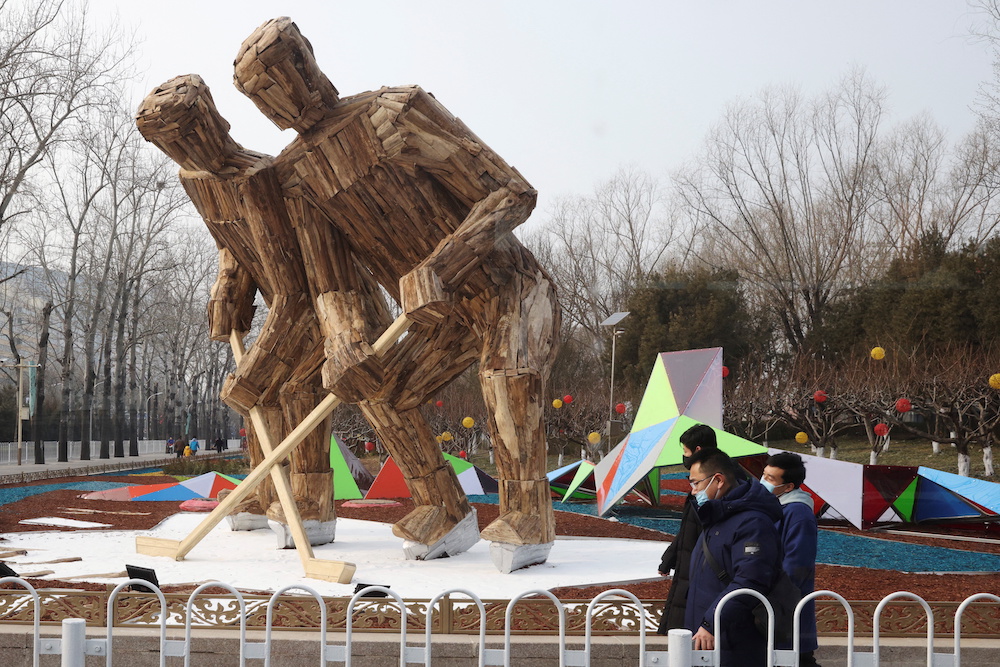 Wooden hockey players stand near the Wukesong Arena ahead of the Beijing 2022 Winter Olympics in Beijing, China, January 30, 2022. u00e2u20acu201d Reuters pic