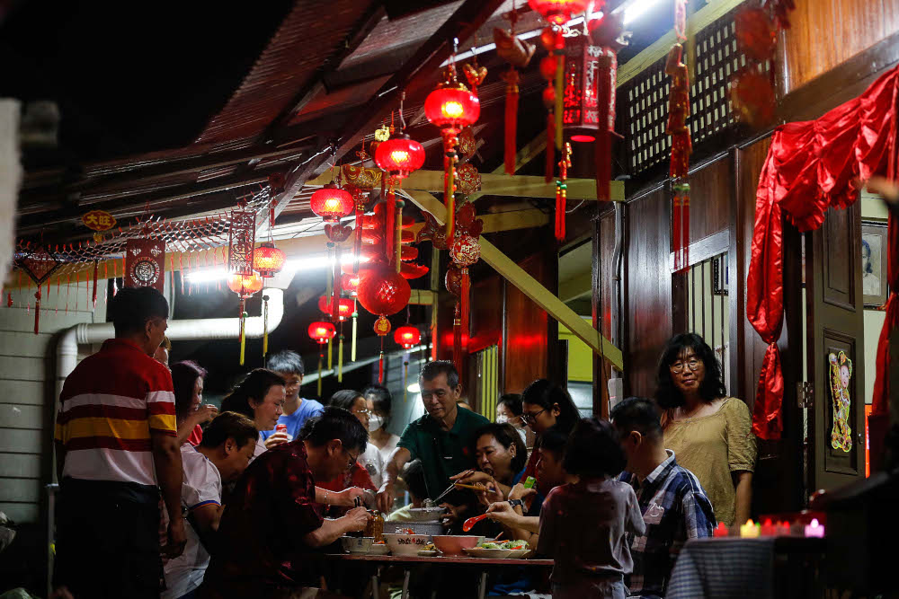 The general sentiment is that marking the auspicious occasion together, after months of separation, is worth the risk despite the highly infectious nature of the Covid-19 variant. — Picture by Sayuti Zainudin