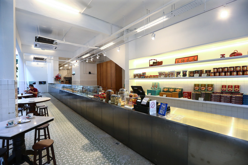 Designed by Amy Liang of CocoKacang interior design studio, Fung Wong's cafe has a modern look with a stainless steel counter spanning more than 50 feet, and with original pillar and floor tiles retained. — Picture by Ahmad Zamzahuri