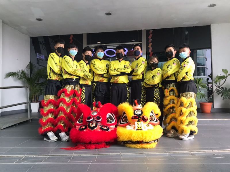 Qixin Lion Dance and Dragon Troupe members adhere to SOPs when performing while hoping for more performance to showcase their talents. u00e2u20acu201d Picture via Wong Weng Wah