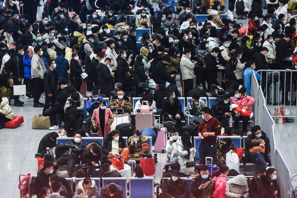 Passengers crowd Hangzhou East Railway Station during the peak travel period ahead of the Lunar New Year, which welcomes the Year of the Tiger on February 1, in the city of Hangzhou January 29, 2022. u00e2u20acu201d AFP pic