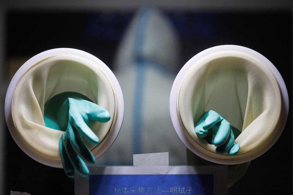 Rubber gloves used to administer throat swab tests are seen at a street booth as the Covid-19 pandemic continues in Beijing, China January 17, 2022. u00e2u20acu201d Reuters pic