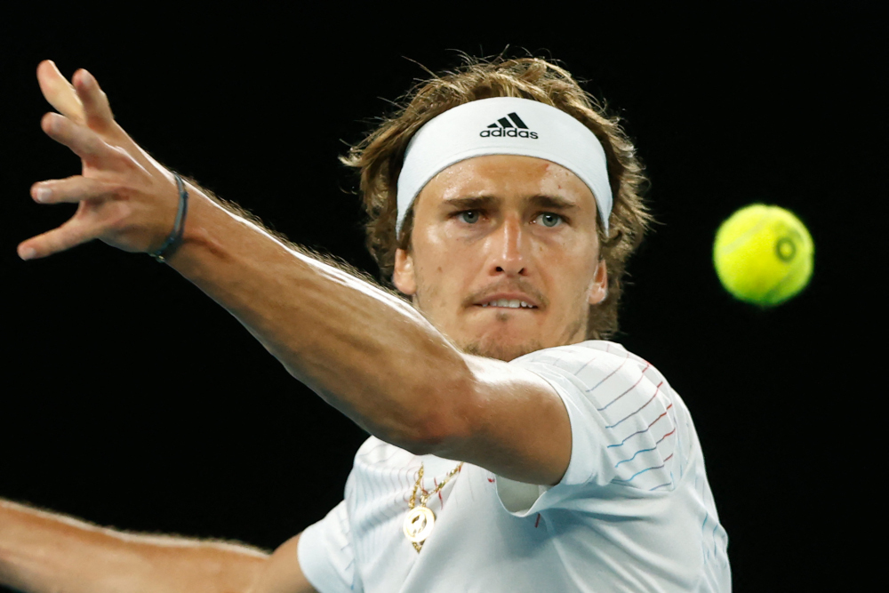 Germanyu00e2u20acu2122s Alexander Zverev hits a return against Germanyu00e2u20acu2122s Daniel Altmaier during their menu00e2u20acu2122s singles match on day one of the Australian Open tennis tournament in Melbourne, January 17, 2022. u00e2u20acu201d AFP picnn