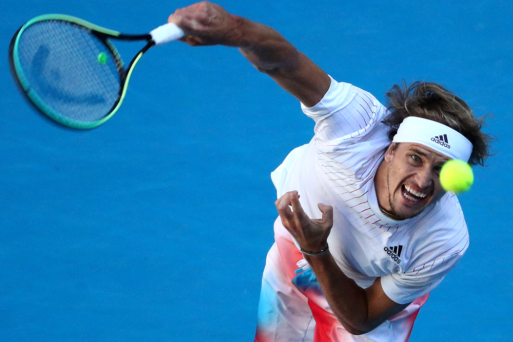 Germanyu00e2u20acu2122s Alexander Zverev serves against Moldovau00e2u20acu2122s Radu Albot during their menu00e2u20acu2122s singles match on day five of the Australian Open tennis tournament in Melbourne, January 21, 2022. u00e2u20acu201d AFP picnn