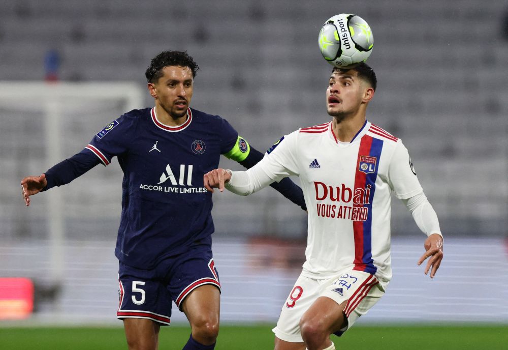 Paris St Germain's Marquinhos in action with Olympique Lyonnais' Bruno Guimaraes (right) at the Groupama Stadium, Lyon January 9, 2022. u00e2u20acu201d Reuters pic