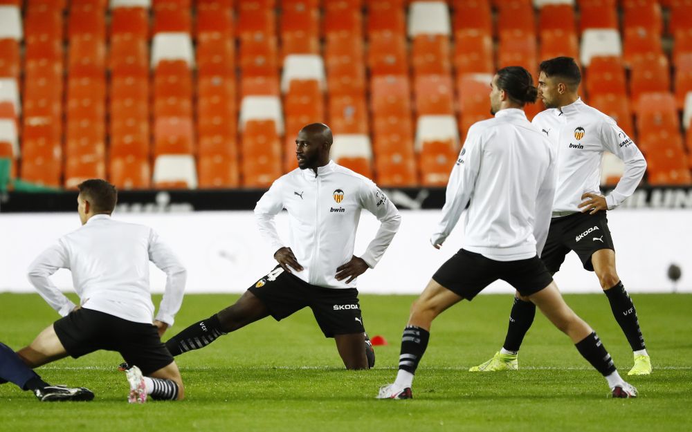 Valencia's Eliaquim Mangala (centre) and teammates warm up before the match against Real Madrid at the Mestalla, Valencia November 8, 2020. u00e2u20acu201d Reuters pic