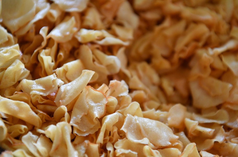 Too said she can produce up to seven jars of Nga Gu chips, which will be sold to neighbours and relatives at between RM15 and RM35 a bottle depending on the size. u00e2u20acu201d Bernama pic