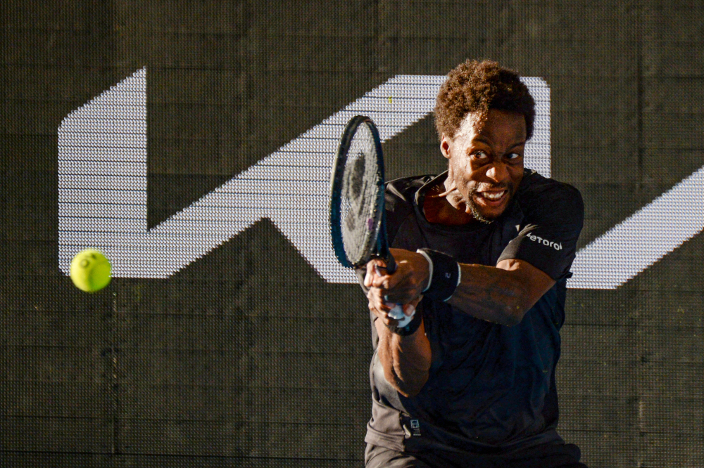 Gael Monfils from France hits a return to Russian Karen Khachanov in the final of the Adelaide International ATP men's singles tennis tournament in Adelaide, January 9, 2022. u00e2u20acu201d AFP picnn