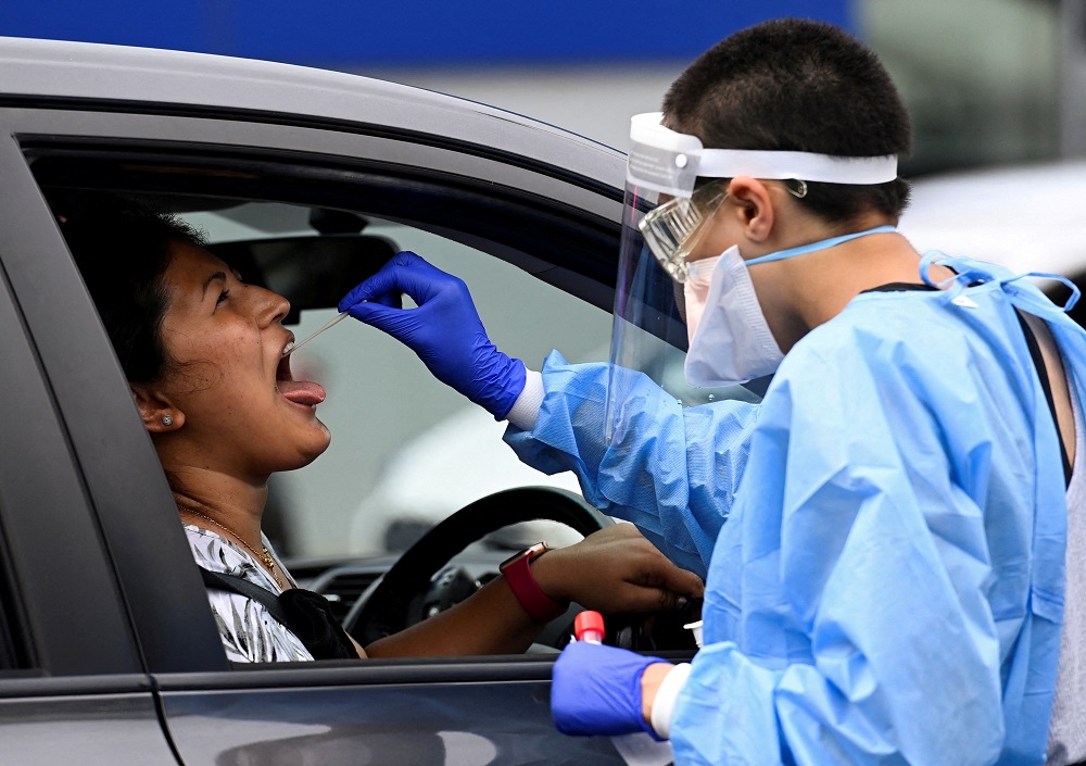 A woman gets tested for Covid-19 at a testing centre in Sydney, Australia January 5, 2022. u00e2u20acu2022 Reuters file pic
