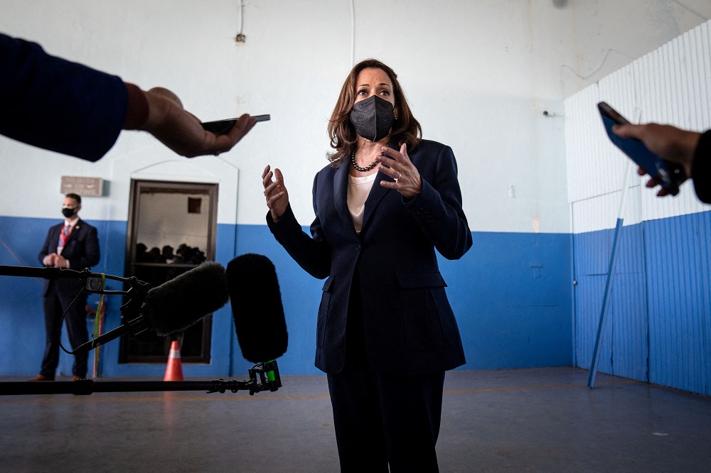 US Vice President Kamala Harris talks to reporters in Palmerola, Honduras January 27, 2022. u00e2u20acu2022 Erin Schaff/Pool via Reuters