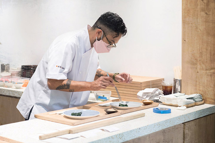 Chef David del Pilar Potes assembling trays of 'ichiju sansai.'