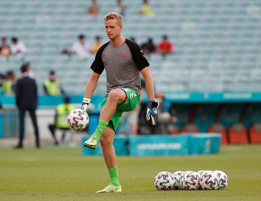 Denmark's Jonas Lossl during the warm up before the match against Czech Republic July 3, 2021. u00e2u20acu2022 Pool via Reuters/Valentyn Ogirenko