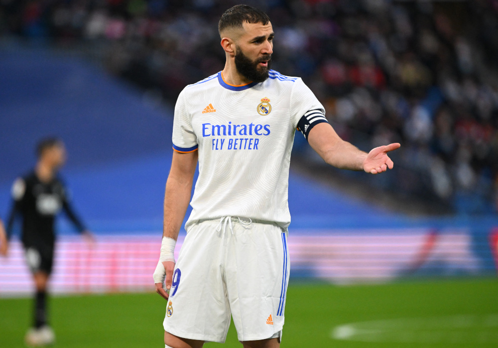 Real Madrid forward Karim Benzema gestures during the Spanish league football match between Real Madrid CF and Elche CF at the Santiago Bernabeu stadium in Madrid, January 23, 2022. u00e2u20acu201d AFP pic 