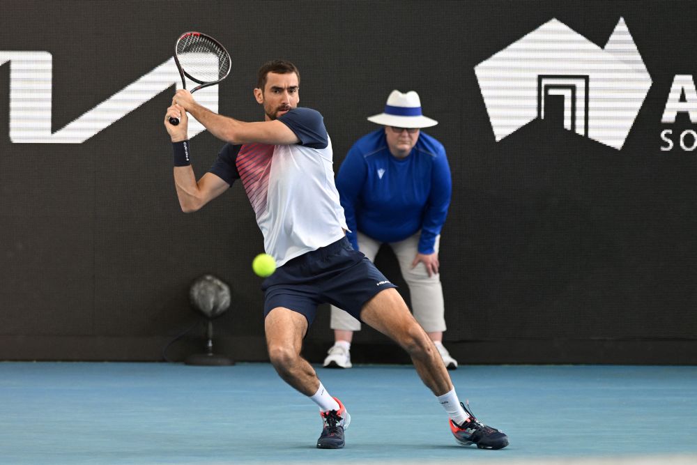 Marin Cilic of Croatia hits a backhand against Karen Khachanov of Russia at the ATP Adelaide International tennis tournament January 8, 2022. u00e2u20acu201d AFP pic