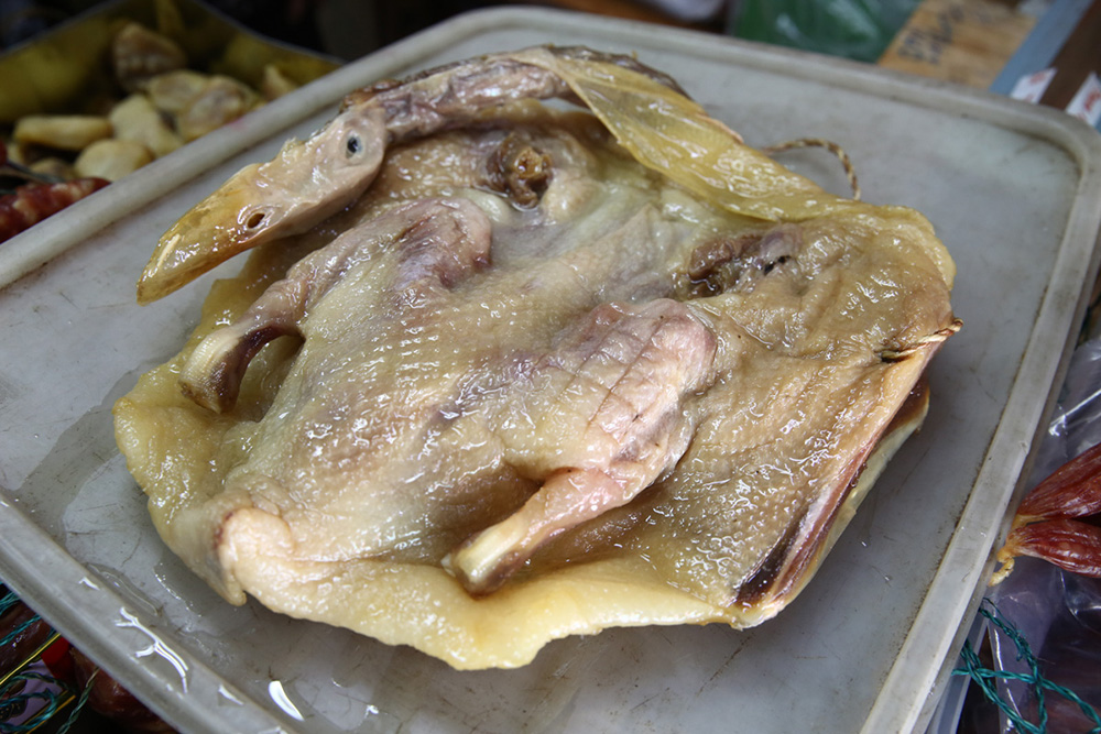 Some families buy the waxed whole duck and use it to cook with various dishes throughout the year. — Picture by Yusof Mat Isa