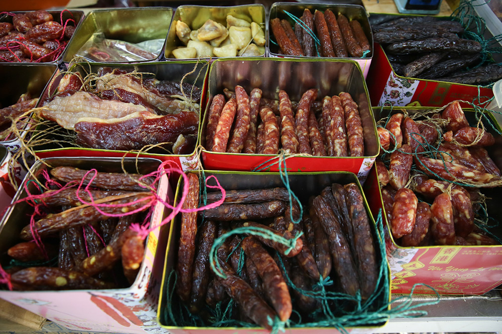 At Chai Huat Hin, you can select from various waxed meats brought in from Hong Kong and local producers for your home needs. — Picture by Yusof Mat Isa