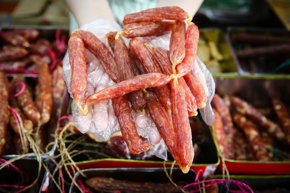 Locally produced waxed sausages are leaner as less fat is used. — Picture by Yusof Mat Isa