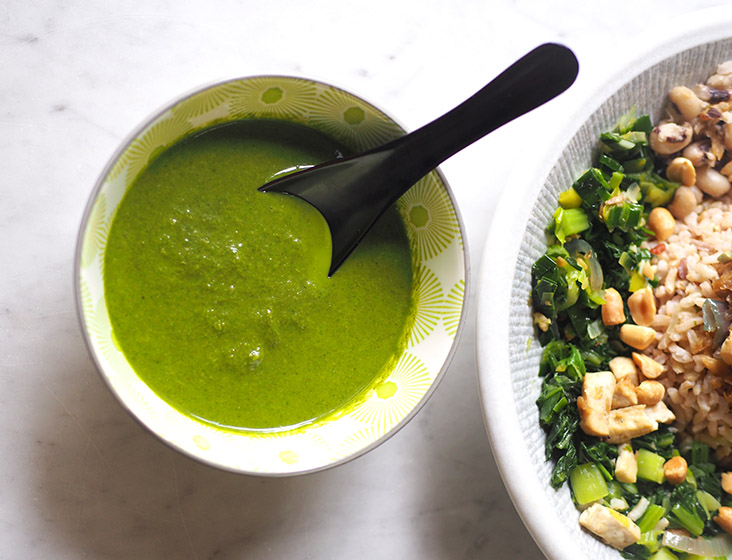 The essence of 'lui cha' is the bright green broth made with herbs and tea