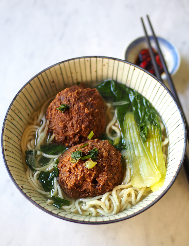 Slurp down these hand-made noodles with a lion head meatball and clear soup for lunch.