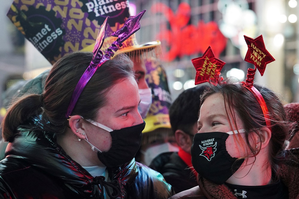 Revellers gather during New Year's Eve celebrations in Times Square, as the Omicron coronavirus variant continues to spread, in the Manhattan borough of New York City December 31, 2021. u00e2u20acu2022 Reuters pic 