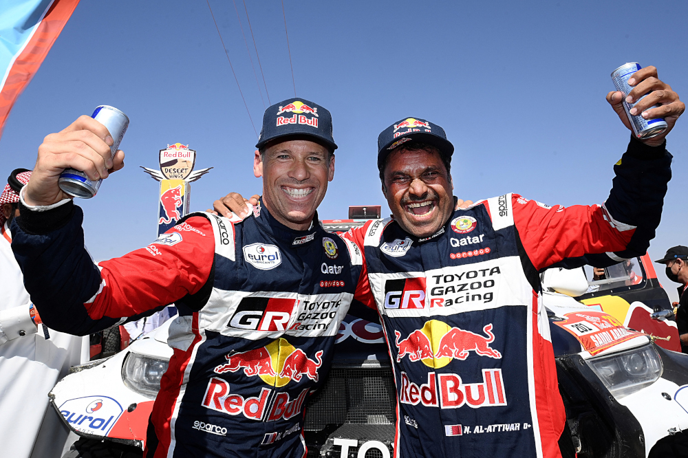 Toyotau00e2u20acu2122s driver Nasser al-Attiyah of Qatar (right) and his co-driver Mathieu Baumel of France celebrates their victory after winning the Dakar Rally 2022, at the end of the last stage between Bisha and Jeddah in Saudi Arabia, January 14, 2022. u00e2u20acu201d AFP p