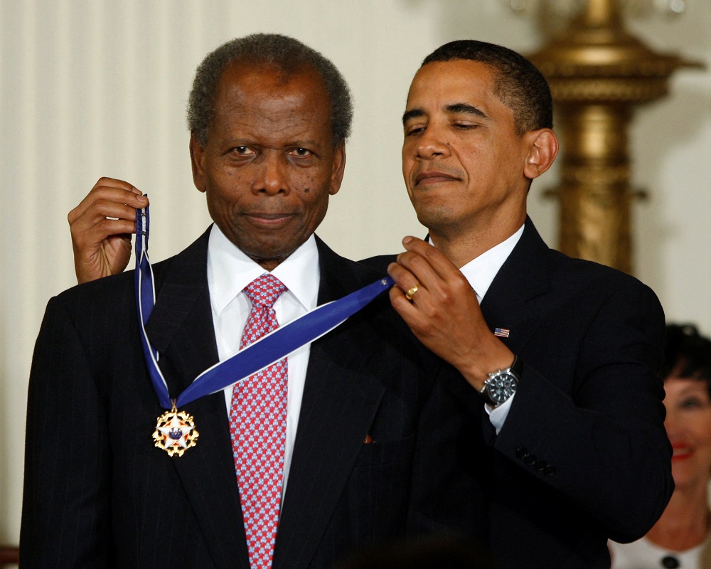 Former US president Barack Obama presents the Medal of Freedom to late actor Sidney Poitier during a ceremony in the East Room of the White House in Washington August 12, 2009. u00e2u20acu2022 Reuters file pic