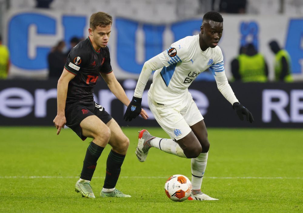 Olympique de Marseille's Pape Gueye (left) in action with Lokomotiv Moscow's Dmitri Rybchinsky at the Orange Velodrome, Marseille December 9, 2021. u00e2u20acu201d Reuters pic
