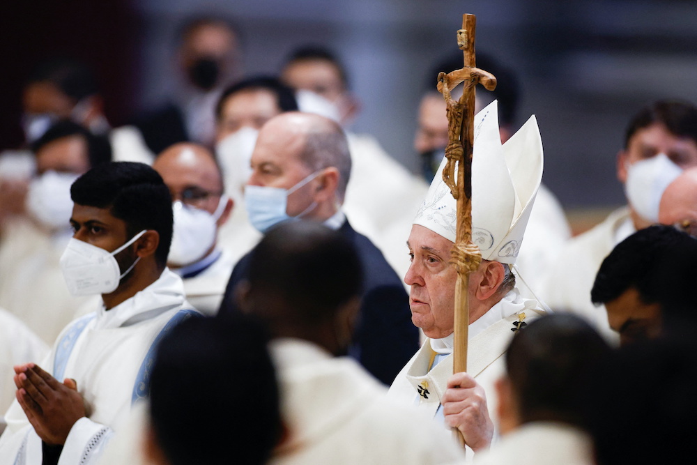 Pope Francis arrives to celebrate Mass to mark the World Day of Peace in St. Peteru00e2u20acu2122s Basilica at the Vatican, January 1, 2022. u00e2u20acu201d Reuters picnn