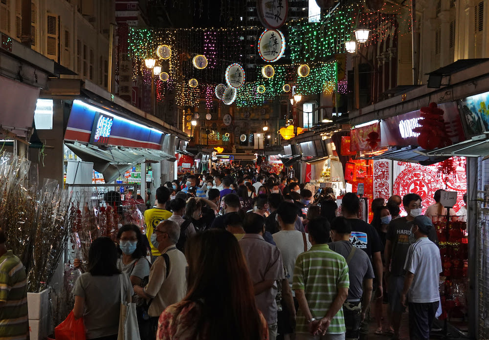 People browsing at shops and stalls in Chinatown in January 2021. u00e2u20acu201d TODAY picnn