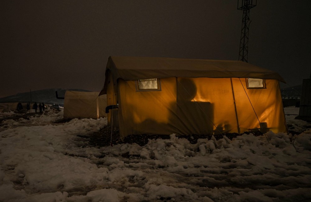Tents in a camp for internally displaced people are surrounded by snow, in the town of Rajo in the countryside of Aleppo in north-western Syria, early on January 22, 2022, following a winter storm. u00e2u20acu2022 AFP pic