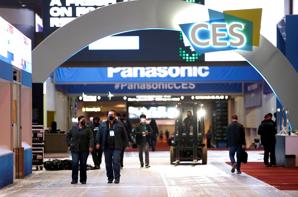 People walk through the lobby of the Las Vegas Convention Center during set up for CES 2022 in Las Vegas, Nevada January 3, 2022. u00e2u20acu2022 Reuters pic