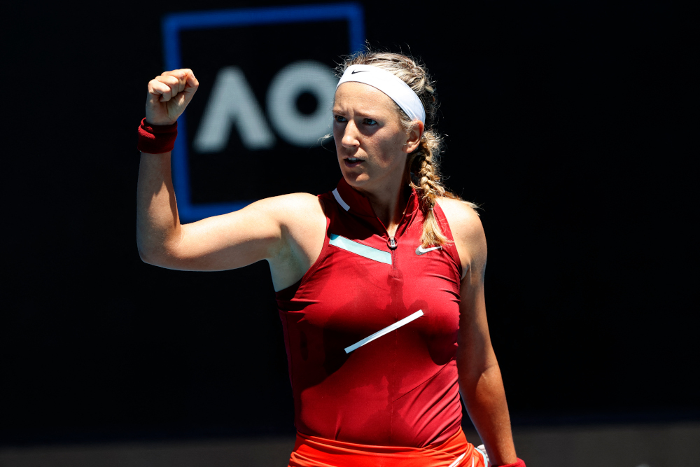 Belarusu00e2u20acu2122 Victoria Azarenka celebrates after winning the match against Switzerlandu00e2u20acu2122s Jil Teichmann during their womenu00e2u20acu2122s singles match on day three of the Australian Open tennis tournament in Melbourne , January 19, 2022. u00e2u20acu201d AFP pic 