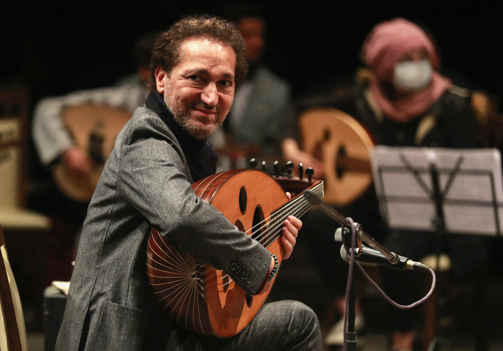 Iraqi musician Naseer Shamma plays the oud during rehearsals at the Iraqi National Theatre in Baghdad. u00e2u20acu201d AFP pic