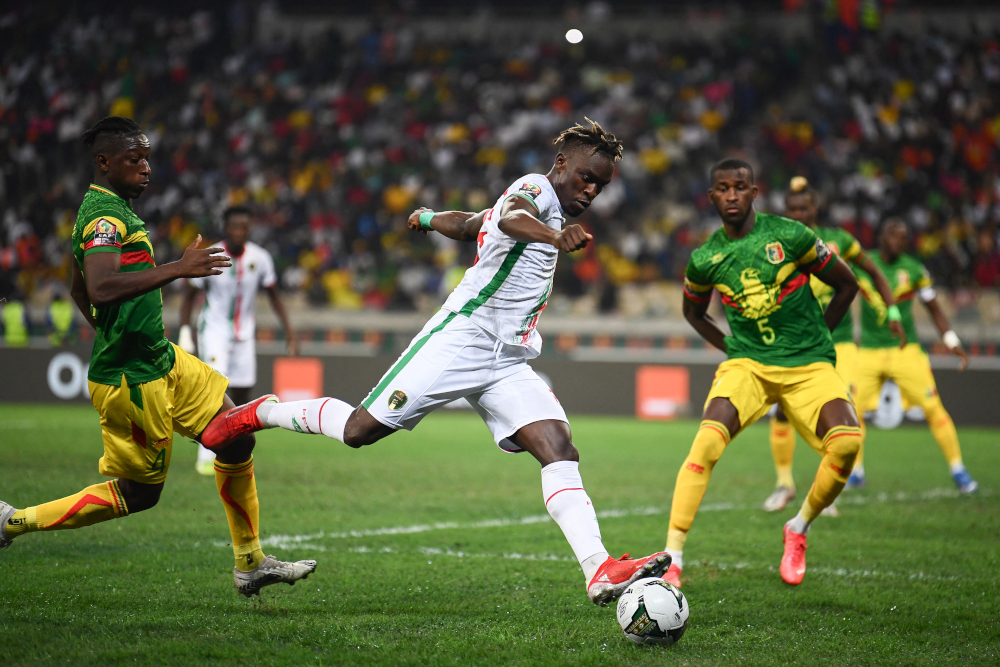 Mauritaniau00e2u20acu2122s forward Pape Ibnou Ba (centre) shoots and fails to score during the Group F Africa Cup of Nations 2021 football match between Mali and Mauritania at Stade de Japoma in Douala, January 20, 2022. u00e2u20acu201d AFP pic 