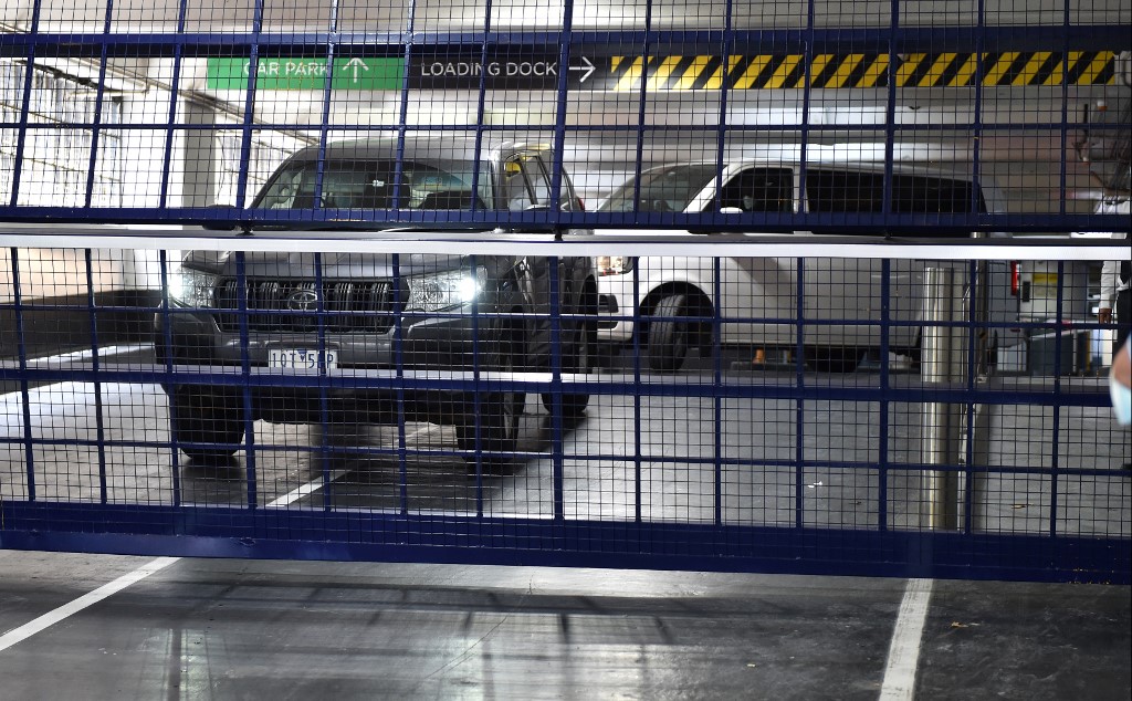 Two Australian Border Force vehicles leave a car park reportedly taking Serbiau00e2u20acu2122s Novak Djokovic back to a Melbourne Detention Centre hotel ahead of his deportation before the Australian Open in Melbourne, January 15, 2022. u00e2u20acu201d AFP pic