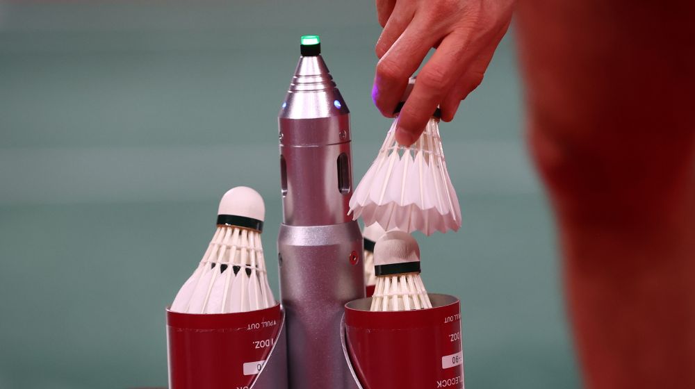 Kevin Cordon of Guatemala picks up a shuttlecock during the match against Lino Munoz of Mexico at the Musashino Forest Sport Plaza during the Tokyo 2020 Olympics July 26, 2021. u00e2u20acu201d Reuters pic