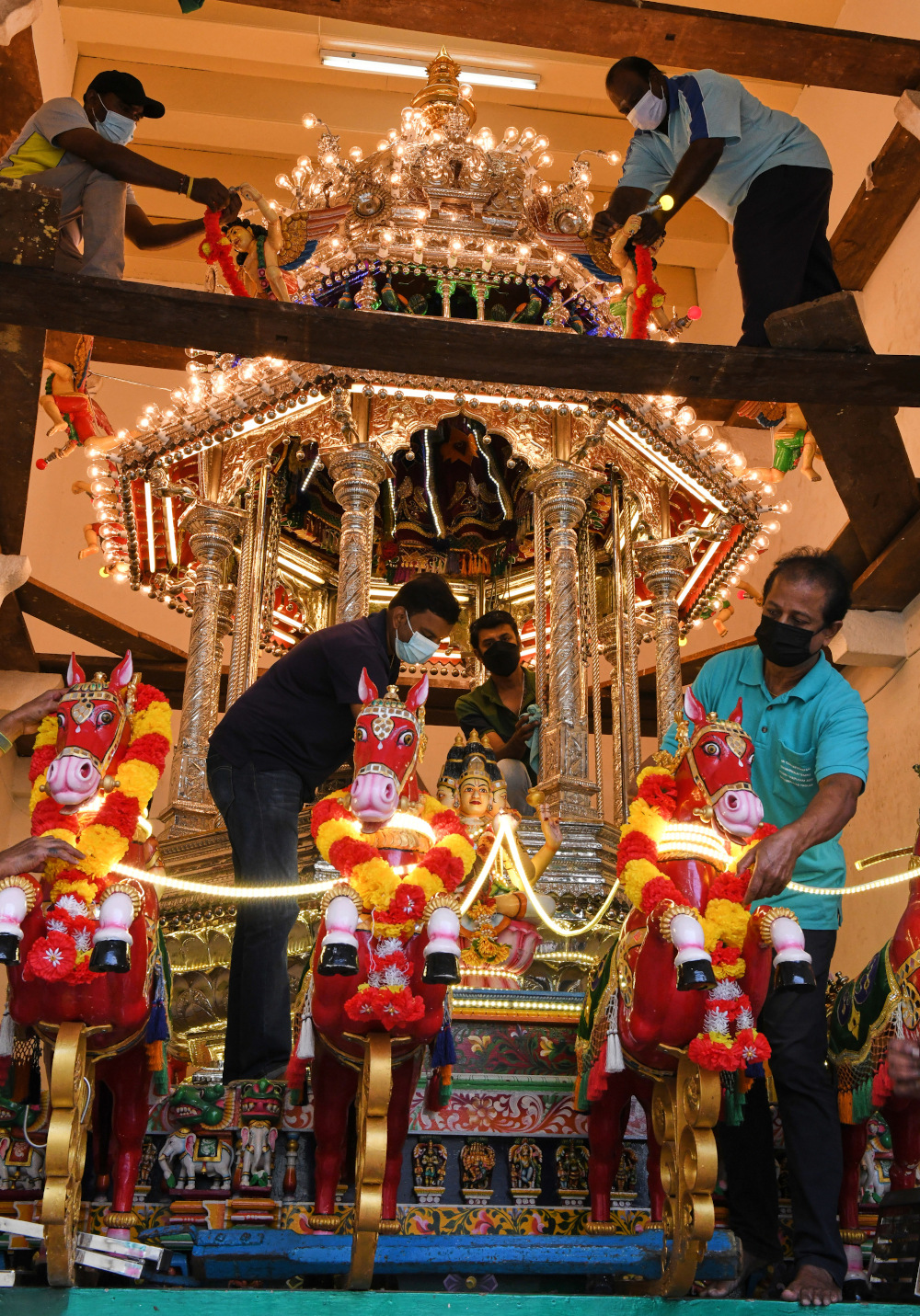 Volunteers decorate a 135-year-old chariot at the Nagarathar Thanduthabani Temple in preparation for Thaipusam in George Town January 8, 2022. — Bernama pic
