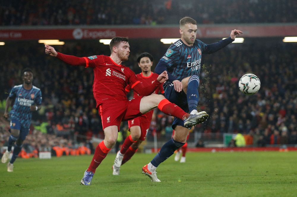 Liverpool's Andrew Robertson in action with Arsenal's Calum Chambers (right) at Anfield, Liverpool January 13, 2022. u00e2u20acu201d Reuters pic