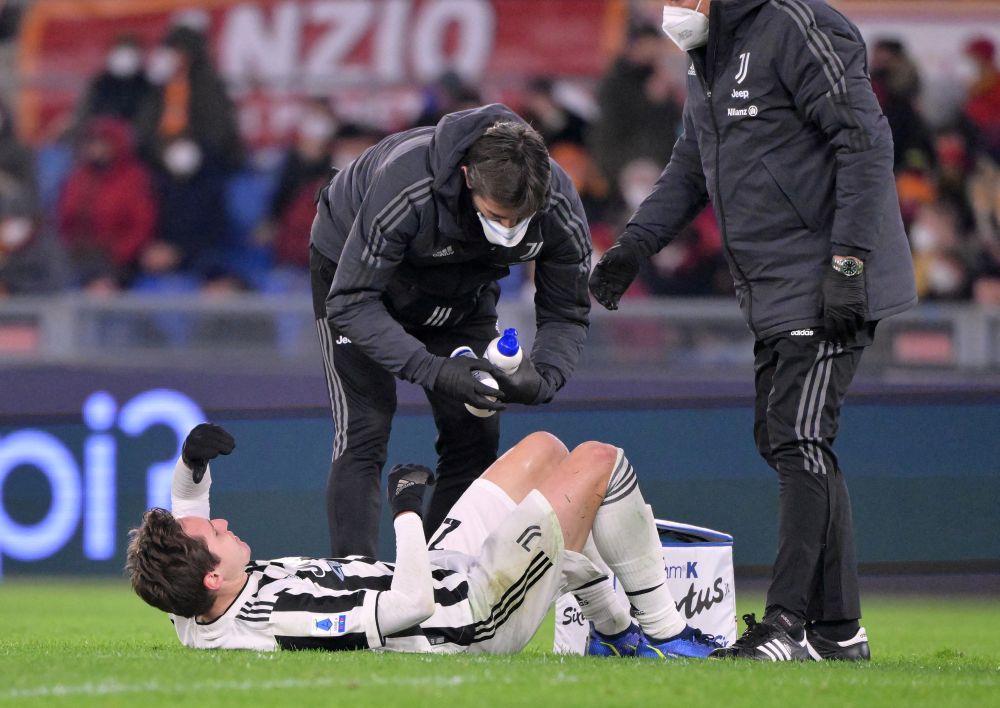 Juventus' Federico Chiesa receives medical attention after sustaining an injury against AS Roma at Stadio Olimpico, Rome January 9, 2022. u00e2u20acu201d Reuters picnn