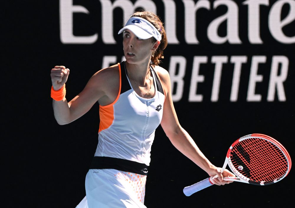 France's Alize Cornet reacts during her fourth round match against Romania's Simona Halep at Melbourne Park January 24, 2022. u00e2u20acu201d Reuters picnn