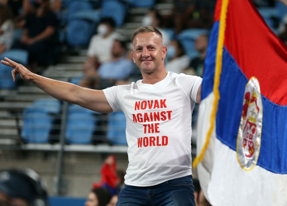 A Serbia fan displays the countryu00e2u20acu2122s flag in support of Novak Djokovic during the AFP Cup group stage match between Spain's Roberto Bautista Agut and Serbia's Dusan Lajovic January 5, 2022. u00e2u20acu201d Reuters picnn