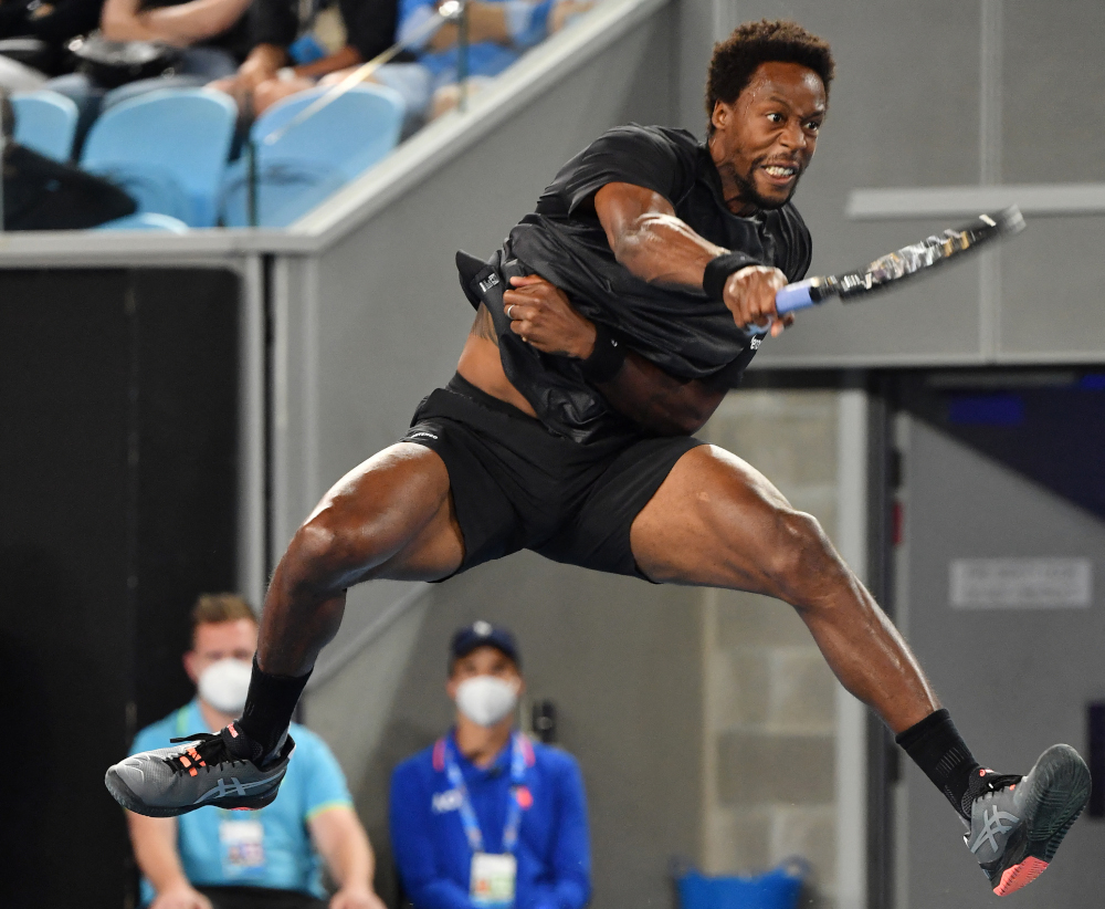 Franceu00e2u20acu2122s Gael Monfils hits a return against Kazakhstanu00e2u20acu2122s Alexander Bublik during their menu00e2u20acu2122s singles match on day three of the Australian Open tennis tournament in Melbourne, January 19, 2022. u00e2u20acu201d AFP picnn