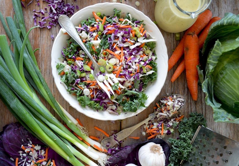 Make a quick slaw with shredded cabbage and lemon juice on busy nights. ― Picture from Unsplash