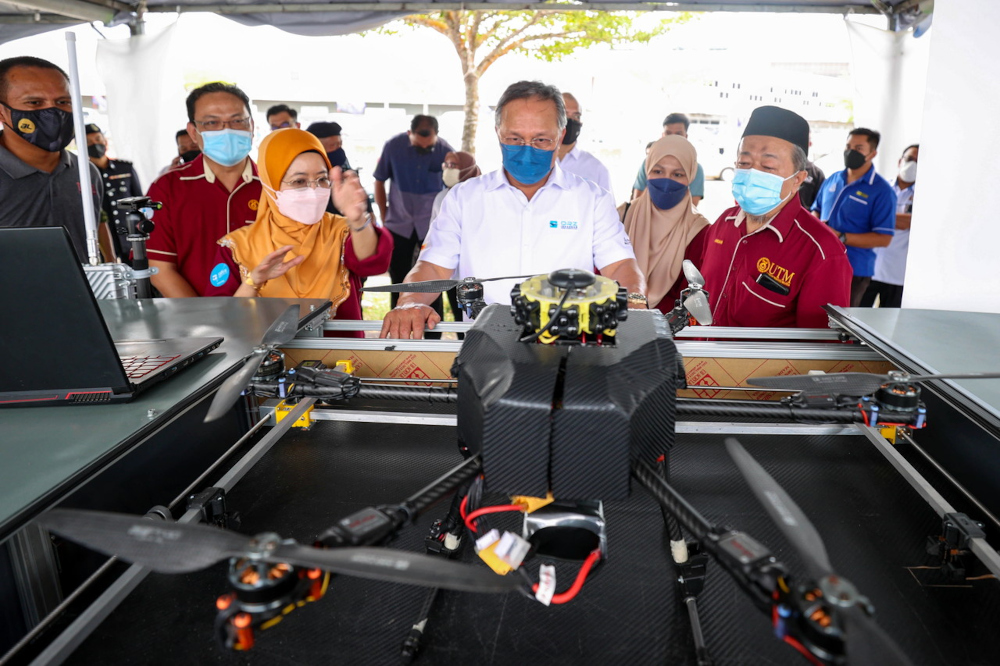 Johor Mentri Besar Datuk Hasni Mohammad watches a drone being set up at Iskandar Puteri, Johor, January 20, 2022. u00e2u20acu201d Bernama pic 