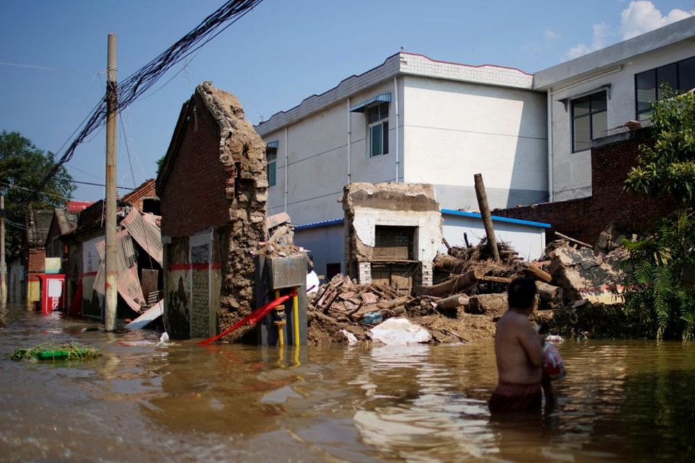 Flooded houses are seen at a village following heavy rainfall in Xinxiang, Henan province, China July 24, 2021. u00e2u20acu201d Reuters pic