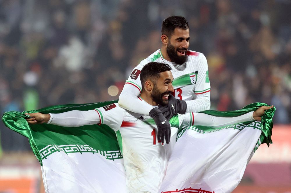 Iran's Saman Ghoddos and Hossein Kanani celebrate after the match against Iraq at the Azadi Stadium, Tehran January 27, 2022. u00e2u20acu201d Reuters pic