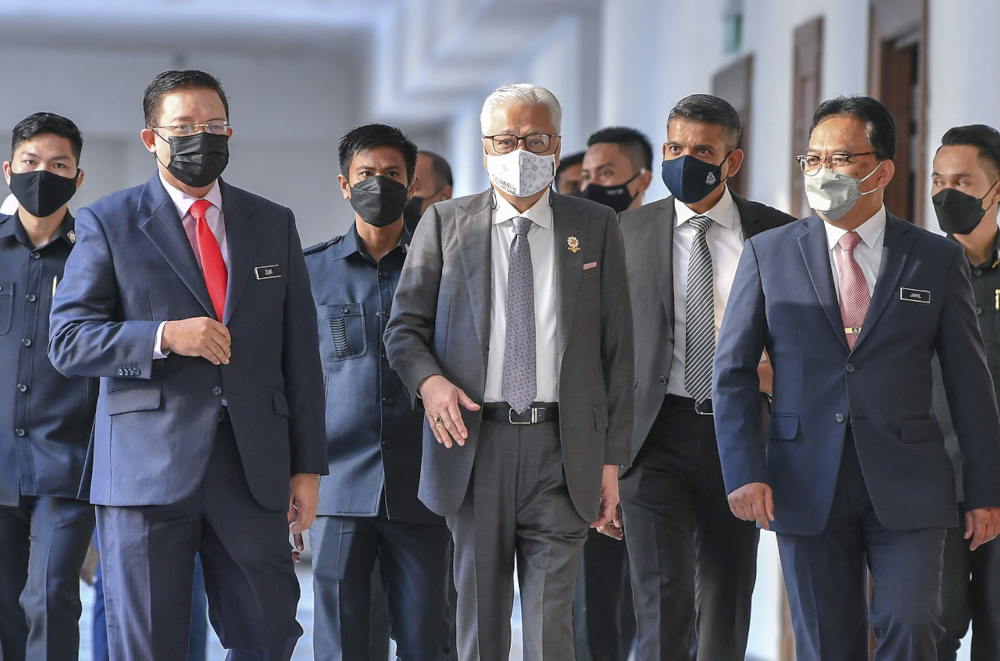 Prime Minister Datuk Seri Ismail Sabri Yaakob with Chief Secretary to the Government Tan Sri Mohd Zuki Ali (left) at the Prime Ministeru00e2u20acu2122s Department in Putrajaya, January 25, 2022. u00e2u20acu201d Bernama pic 